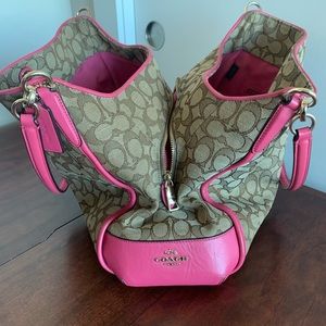 Coach purse pink leather & brown. 3 storage areas. Used in very good condition.